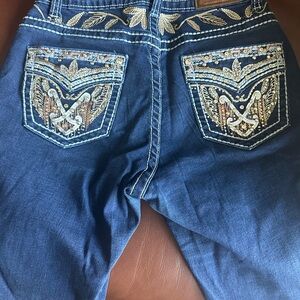 Blue Boot Cut Jeans with Embroidered Design